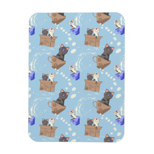 Cats in box and milk drops on blue magnet