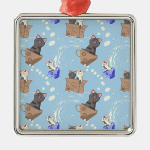 Cats in box and milk drops on blue metal ornament