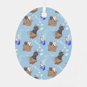Cats in box and milk drops on blue metal tree decoration