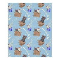 Cats in box and milk drops on blue