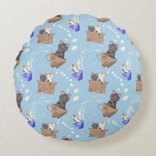Cats in box and milk drops on blue round cushion