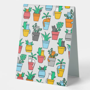 Cats in the flowerpots
