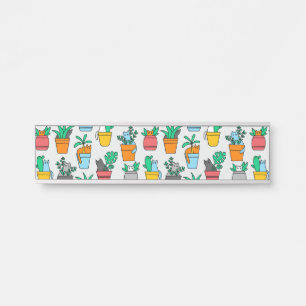 Cats in the flowerpots door sign