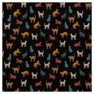Cats on the black fabric