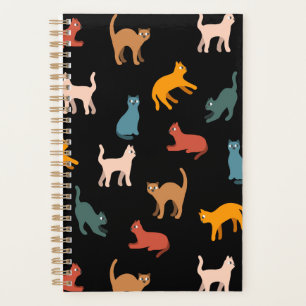Cats on the black planner