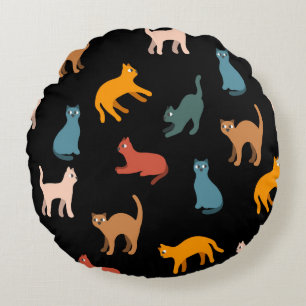 Cats on the black round cushion