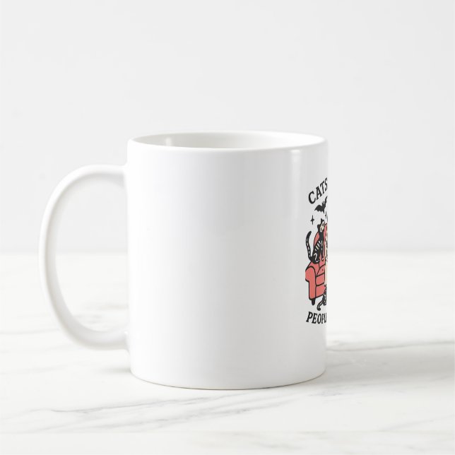 Cats People Are Creepy Skeleton Halloween Tee Over Coffee Mug (Left)