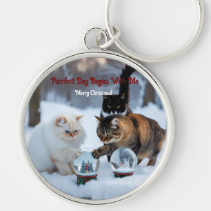 Cats playing with snowglobes key ring