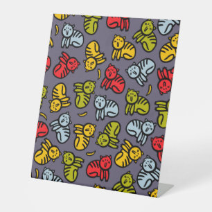 Cats plus bananas pedestal sign