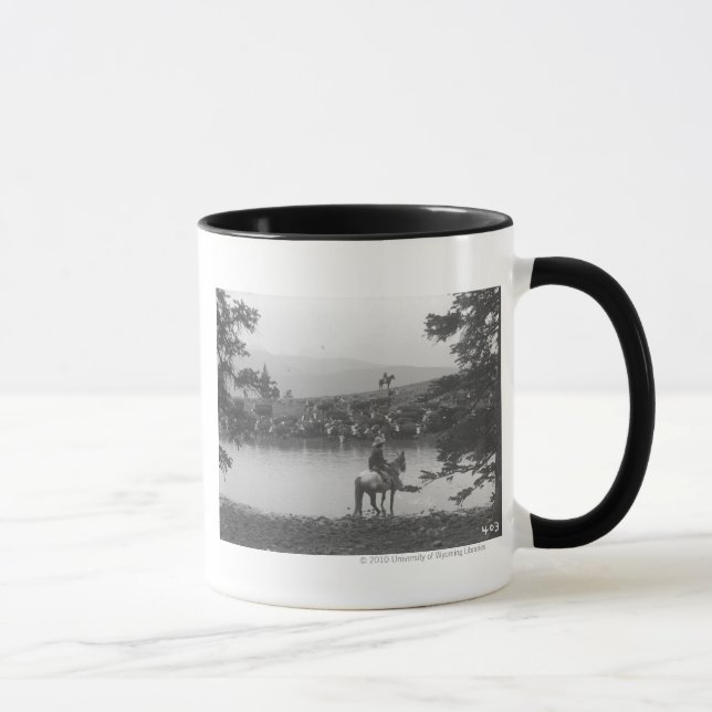 Cattle by a pond with two cowboys. mug (Right)