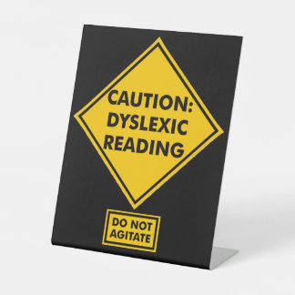 Caution: Dyslexic Reading Pedestal Sign