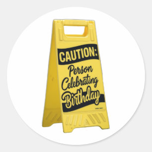 Caution person celebrating brithy with yellow sign classic round sticker