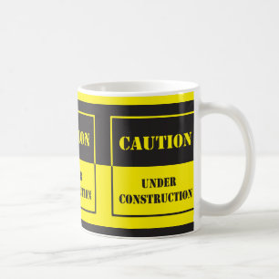 caution sign under construction coffee mug