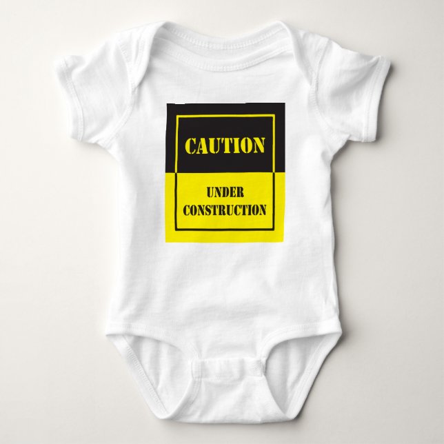 caution under construction baby bodysuit (Front)