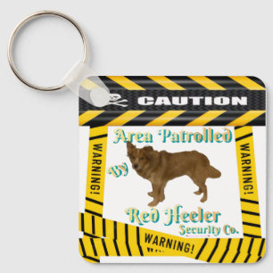 Caution-Warning Area Patrolled By Red-Heeler Key Ring
