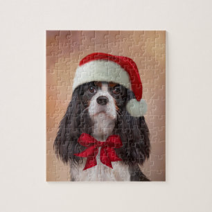 Cavalier King Charles Spaniel in red hat of Santa Jigsaw Puzzle