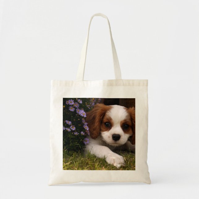 Cavalier King Charles Spaniel Puppy behind flowers Tote Bag (Front)
