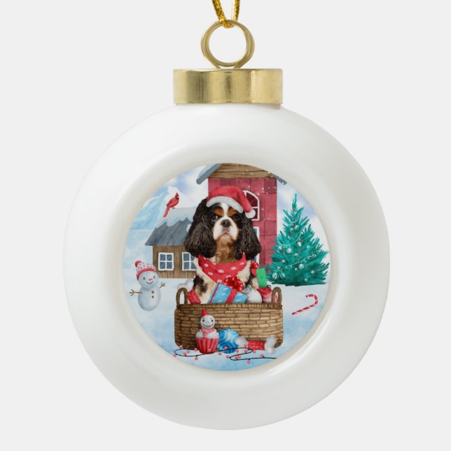 Cavalier King Dog In snow Christmas Dog House Ceramic Ball Christmas Ornament (Front)
