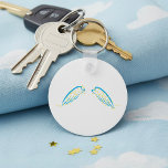 Celestial Angel Wings with Sparkling Stars  Key Ring<br><div class="desc">Embrace celestial elegance with this exquisite keychain featuring a stunning graphic of angel wings adorned with vibrant green stars. Perfect for adding a touch of divine charm to your keys, backpack, or purse, this keychain is a beautiful blend of spirituality and style. The delicate wings, highlighted by the shimmering green...</div>
