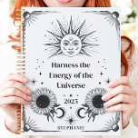 Celestial Sun and Moon Custom Name Manifestation  Planner<br><div class="desc">This enchanting design features celestial-inspired illustrations of the sun, moon, and stars, paired with blooming sunflowers and cosmic motifs. The bold black-and-white artwork creates a mystical and empowering vibe, perfect for manifesting goals and harnessing positive energy in 2025. Personalised with a custom name, this design is ideal for astrology enthusiasts,...</div>