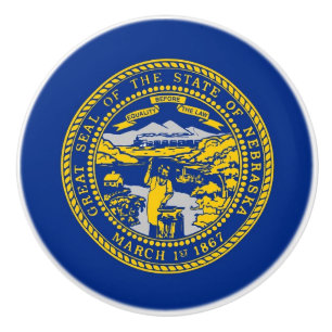 Ceramic knob pull with flag of Nebraska, USA