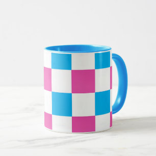 Ceramic mug with colorful tile pattern.