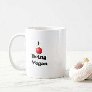 Ceramic mug with I Love Being Vegan design