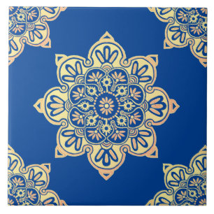 Ceramic tile, yellow medallion on deep blue tile