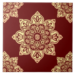 Ceramic tile, yellow medallion on maroon tile