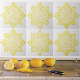 Ceramic tile, yellow medallion on white ceramic tile