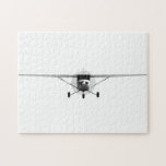 Cessna 152 jigsaw puzzle<br><div class="desc">A Cessna 152 with transparent background. Front view showing a cockpit,  wings,  turning propeller and landing gear. This is a 3D image. Image by Jan Brons</div>