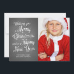 Chalkboard Holiday Photo Christmas Wishes Coral<br><div class="desc">Chalkboard holiday cards featuring the words "wishing you a merry christmas and a happy new year", in white, cute and curly calligraphy like typeface, and one photo template of smiling girl dressed like santa claus. The back of these chalkboard Christmas cards feature a festive nautical design, with a coral and...</div>