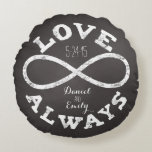 Chalkboard Infinity Love Wedding Date and Names Round Cushion<br><div class="desc">Celebrate the infinite love between your favourite bride and groom with this customisable round pillow! A white chalk infinity symbol and “Love Always” text surrounds a couple's names and wedding date on a black chalkboard background. Makes a beautiful,  modern,  personalised gift for newlyweds.</div>