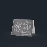 Chalkboard Snowflake Wedding Thank You Note Cards<br><div class="desc">Beautiful snowflake wedding thank you cards with two pretty snowflakes with a leaf and floral design and heart shaped snow and ice reflections inside the thank you note. Pretty chalkboard background in different shades of grey. Perfect for a winter wonderland holiday or Christmas themed wedding. It can be personalised with...</div>
