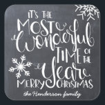 Chalkboard Snowflake Wonderful Merry Christmas Square Sticker<br><div class="desc">Beautiful typography based holiday sticker. "It's the most wonderful time of the year" appears in white hand-lettered typography on a charcoal grey chalkboard background accented with white snowflakes.</div>