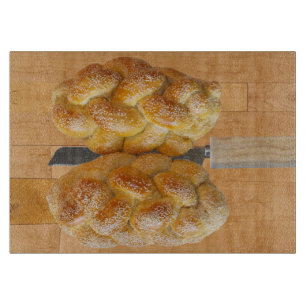 Challah On Cutting Board With Knife