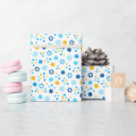 Chanukah Jewish Stars Snowflakes White Blue Gold Wrapping Paper<br><div class="desc">Add some holiday colour and sparkle with this fun Chanukah wrapping paper design. Appropriate for children or adults, corporate or family gift wrap needs. There are coordinating gift bags, tissue paper, and ribbon for a complete Chanukah look, or you can mix and match with our other Chanukah wrapping paper patterns....</div>