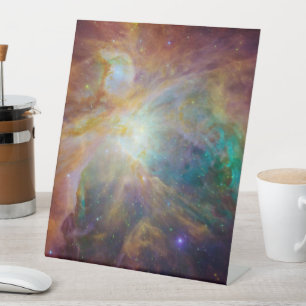 Chaos at Heart of Orion Spitzer Hubble Composite Pedestal Sign