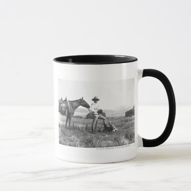 Charles Belden with horse and skull. Mug (Right)