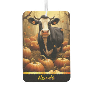 Charming cow among pumpkins on a golden autumn day car air freshener