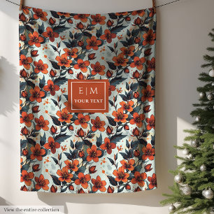 Charming dill green and deep orange floral fleece blanket
