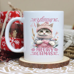 Charming winter cat knitting in soft pastel colour coffee mug
