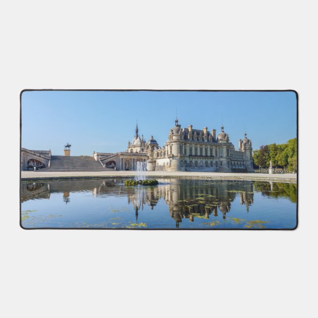 Chateau de Chantilly with reflection in a pond Desk Mat (Front)