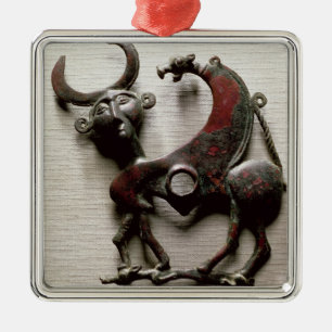 Cheek piece of a horse bit in the form of a human- metal ornament