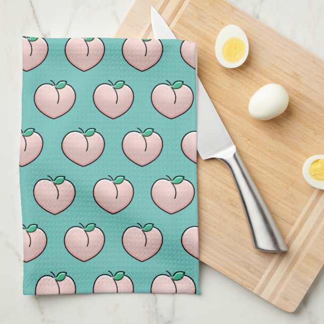 Cheeky Peach Pattern on Teal Tea Towel (Quarter Fold)