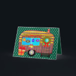 Cheerful and Festive Retro Camper Holiday Card<br><div class="desc">An adorable retro camper trailer Is decorated for the holidays. The festive camper Is adorned with bright cheerful plaid. The door is decorated with a pine wreath and ribbon bow. Vintage holiday ornaments hang in the window. Holly leaves and berries are placed over the window. Sleigh bells with a bow...</div>