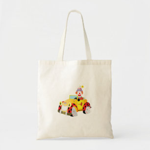 cheerful clown drives a whimsical yellow car tote bag