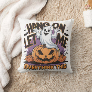 Cheerful Halloween ghost atop a carved pumpkin Cushion