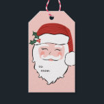 Cheerful Santa Face | Pink and Red Christmas Gift  Gift Tags<br><div class="desc">This gift tag features a cheerful Sant face on a pink background with a place for you to write in the names of who it's to and from on Santa's beard. The back has pink and red diagonal stripes.</div>