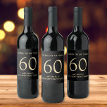 Cheers to 60 Years Black Gold 60th Birthday Party Wine Label<br><div class="desc">Elegant black and gold 60th birthday wine label featuring the classic phrase “Cheers to 60 Years” in refined gold typography, this minimalist design adds sophistication to every bottle. Personalize with the guest of honor’s name and milestone year for a timeless custom touch. Whether you’re hosting a 60th birthday dinner, cocktail...</div>